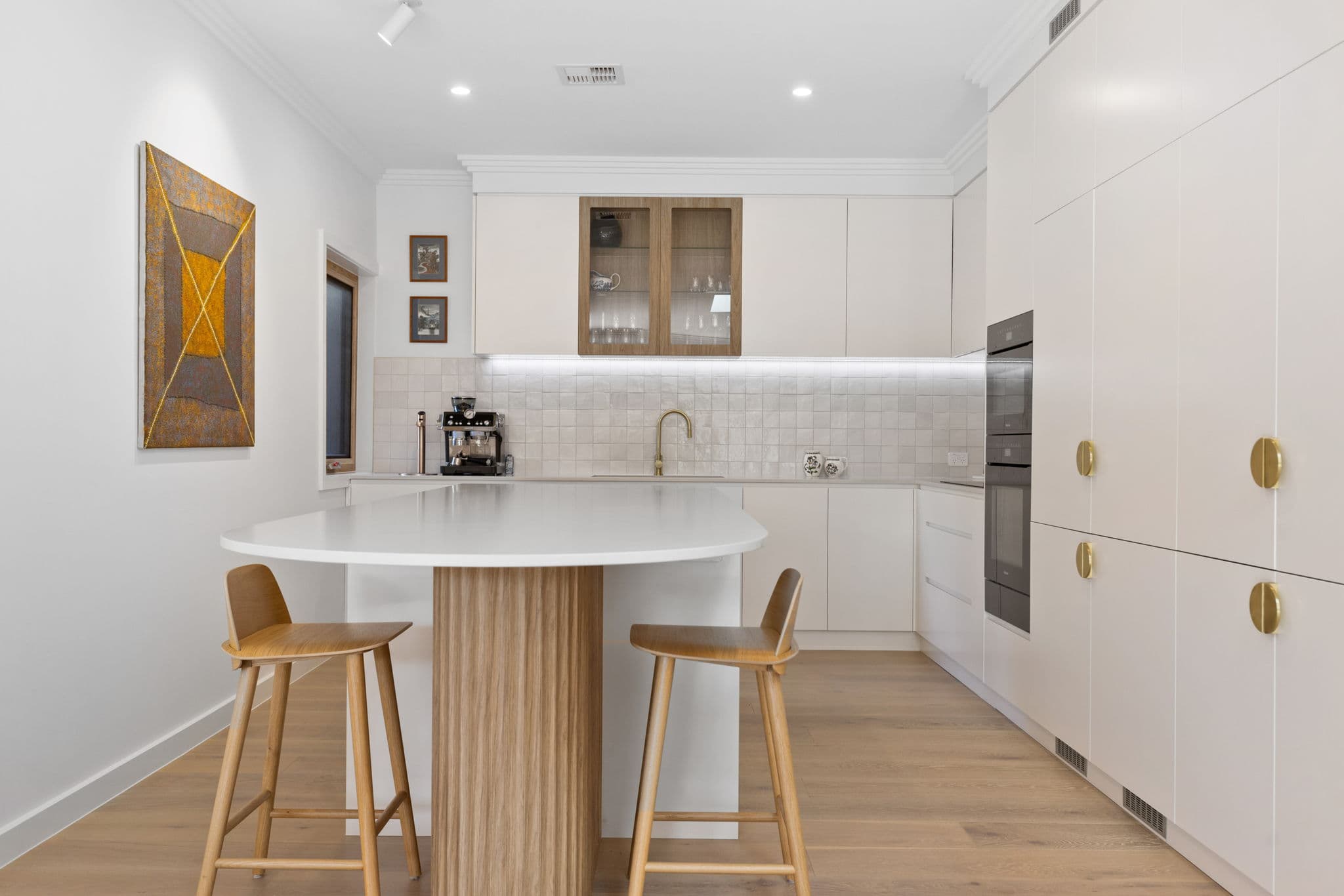 Modern renovated kitchen with island bench and quality finishes in Canberra home