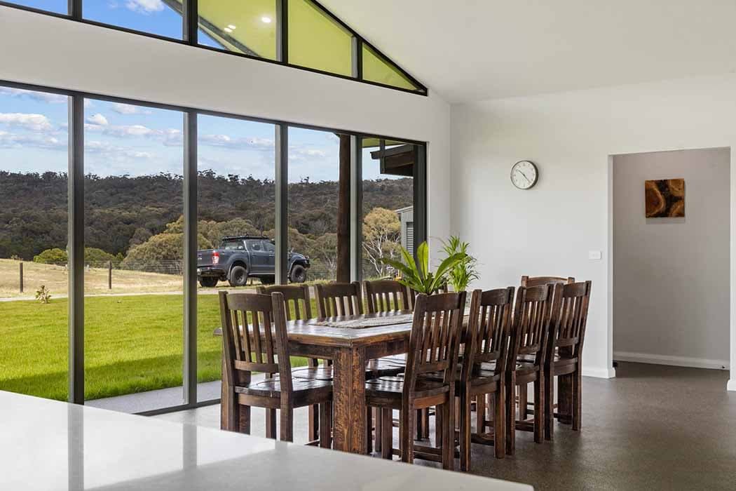 Modern dining area in a new build home in Canberra, Australia with stunning views.