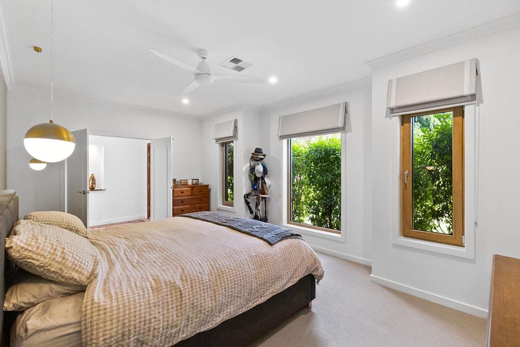 Modern bedroom renovation in Canberra, Australia with natural light and stylish finishes.