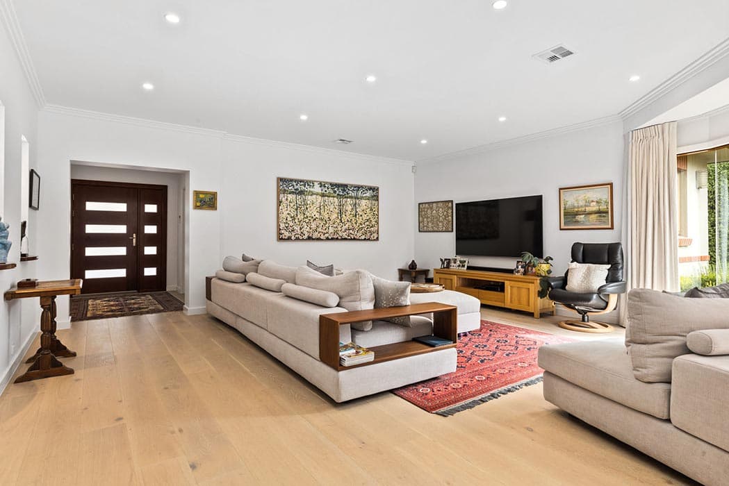 Modern living room renovation in Canberra, Australia with stylish design and natural light.