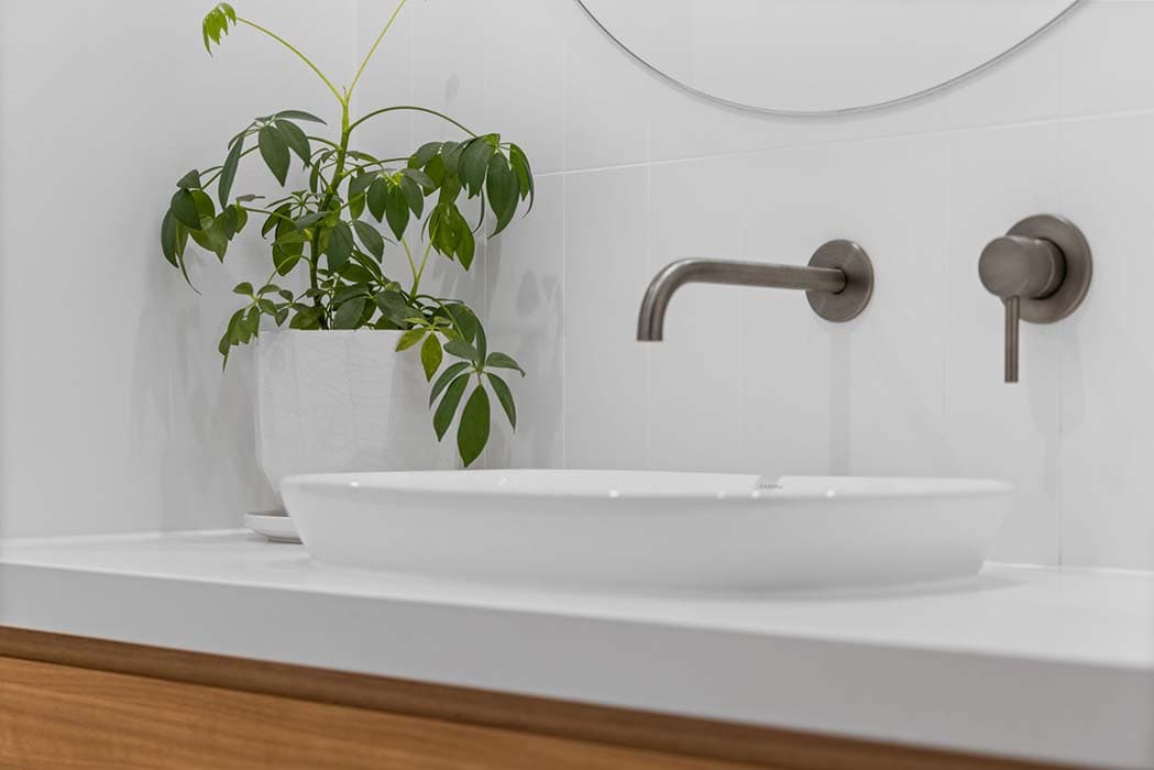 Modern bathroom renovation in Canberra with sleek sink and stylish fixtures