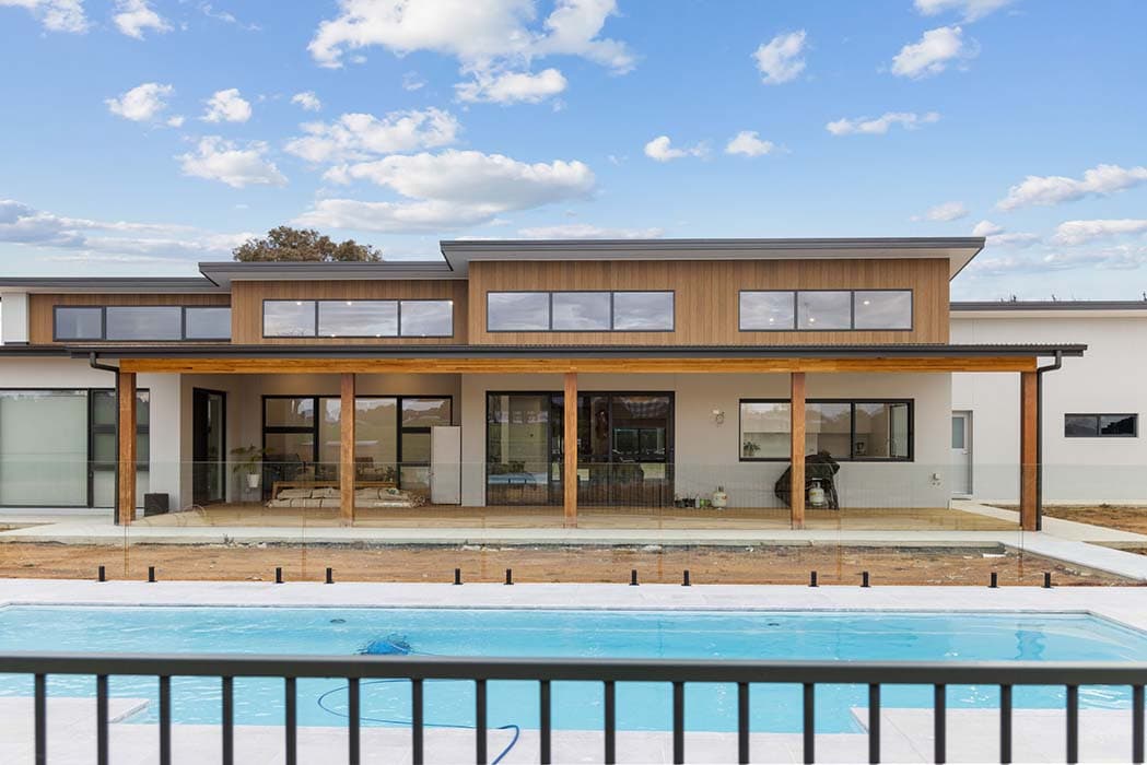Modern new build in Canberra with pool and timber features