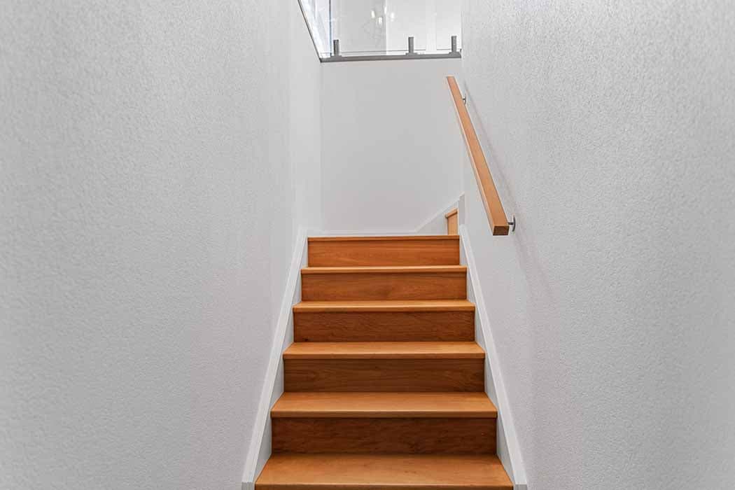 Modern wooden staircase design in a renovated home in Canberra, Australia