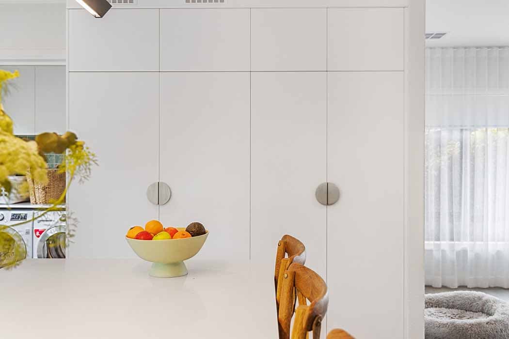 Modern kitchen renovation in Canberra, Australia with sleek cabinetry and bright design.