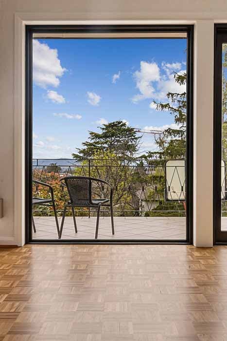 Modern living space with balcony view in Red Hill, Canberra, Australia