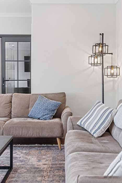Stylish living room renovation in Canberra, Australia with modern decor and elegant finishes.