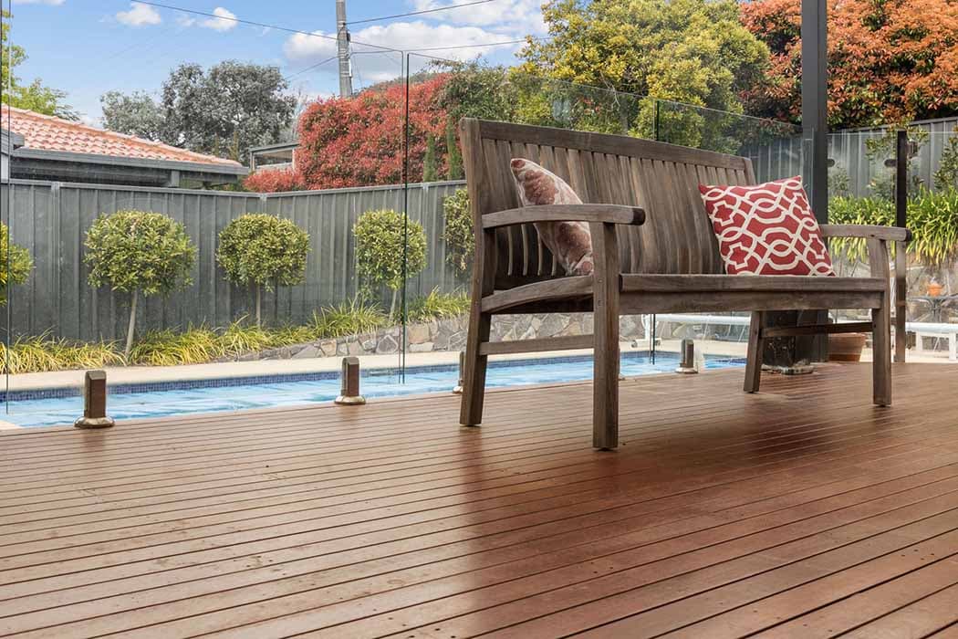 Outdoor renovation in Canberra with wooden deck and pool area