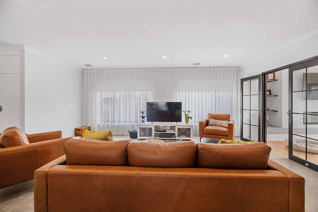 Modern living room renovation in Canberra, Australia with stylish finishes and natural light.