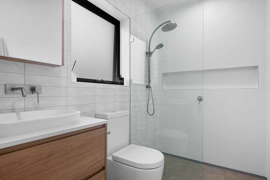 Modern bathroom renovation in Canberra, Australia with sleek design and elegant finishes.
