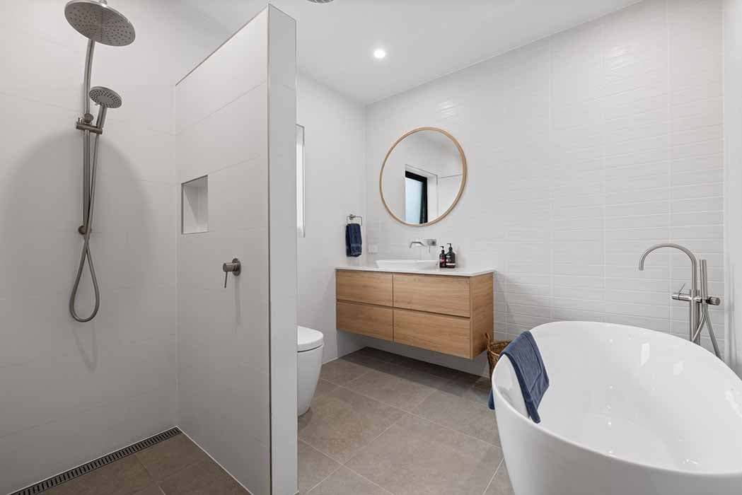 Modern bathroom renovation in Canberra, Australia with sleek design and luxury finishes.