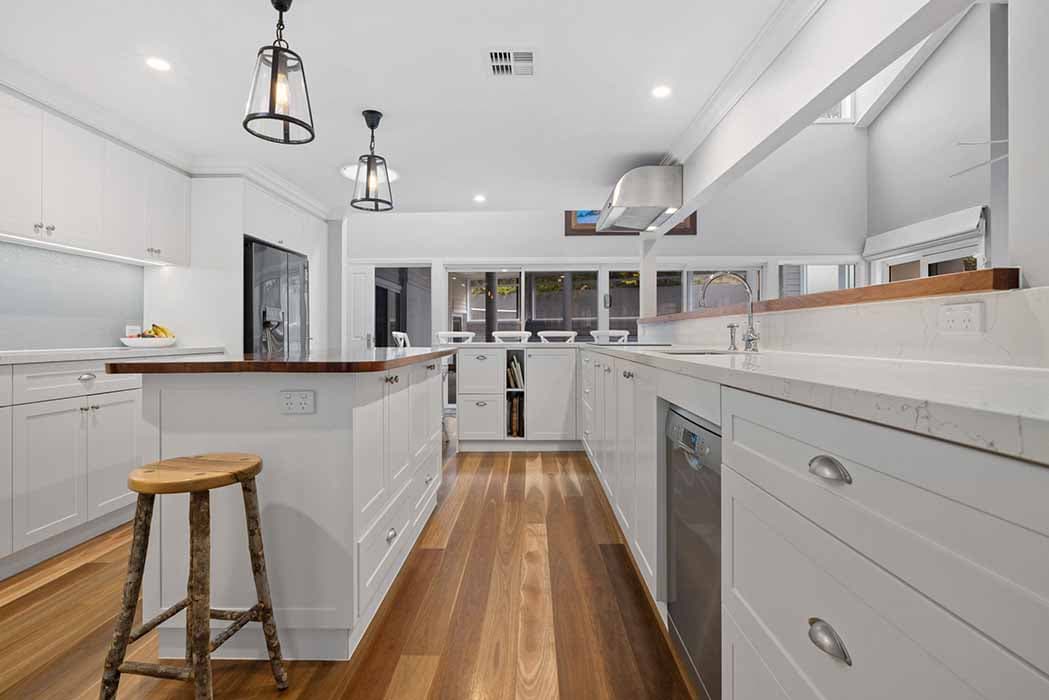 Modern kitchen renovation in Canberra, Australia with timber accents and sleek finishes.