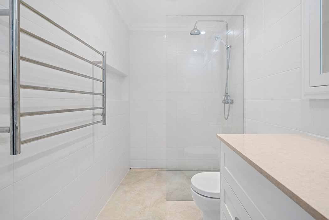 Modern bathroom renovation in Canberra, Australia with sleek finishes and spacious layout.