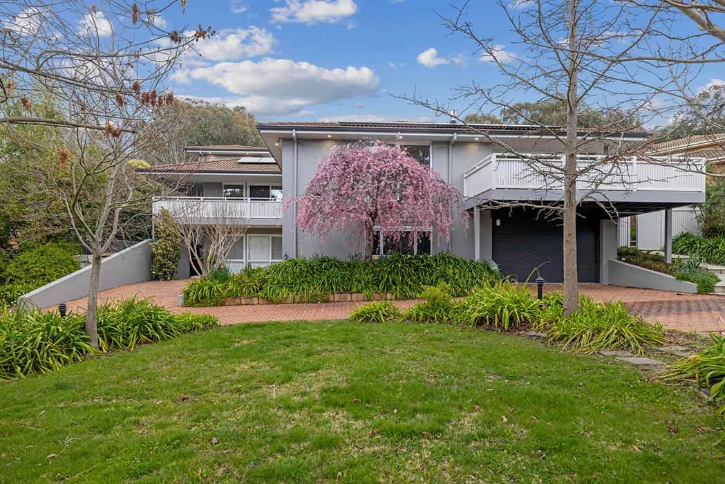 Modern home renovation in Canberra, Australia with landscaped garden and stylish facade.