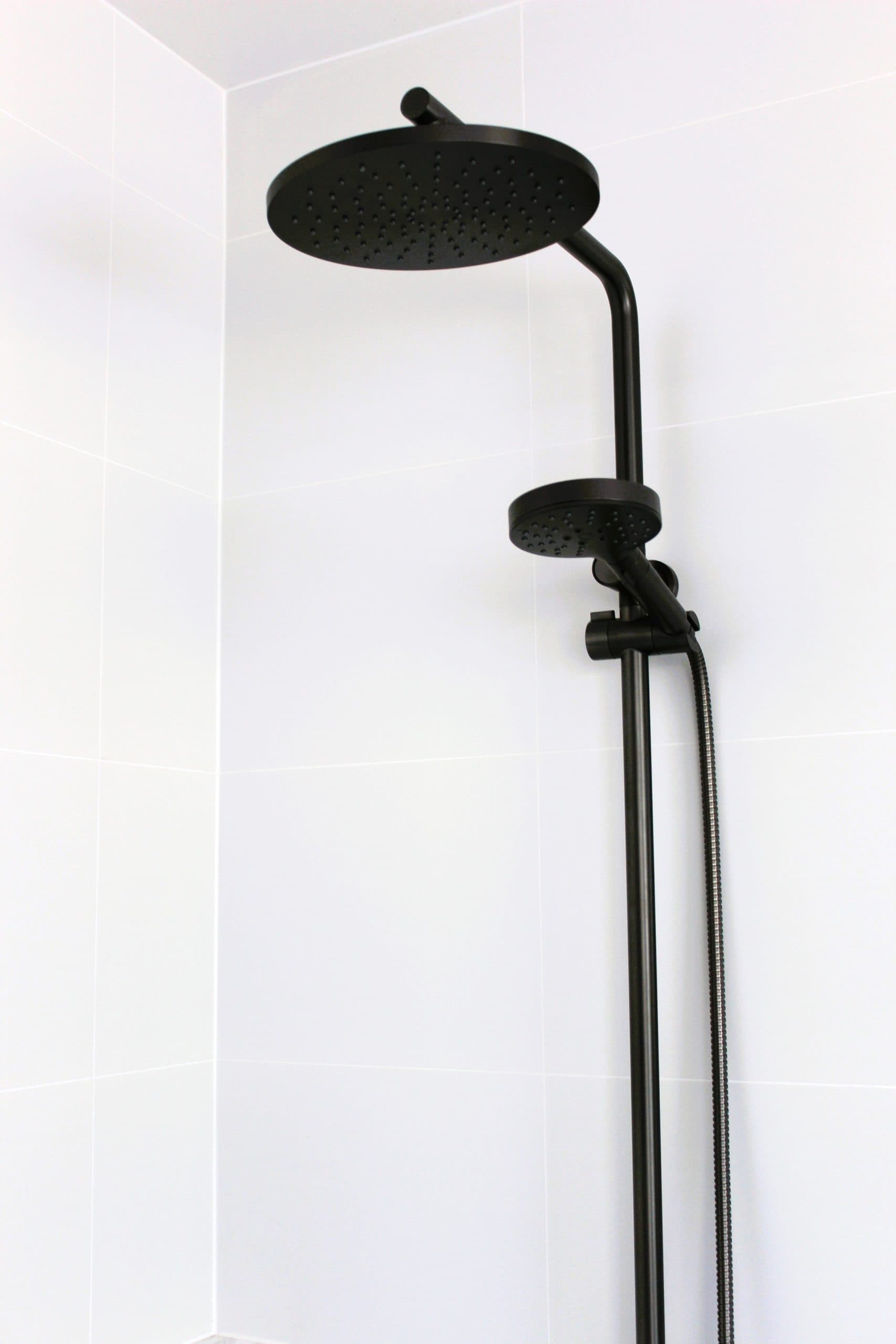 Stylish black shower system in a modern Canberra bathroom renovation